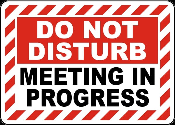 Do Not Disturb Sign Meeting In Progress